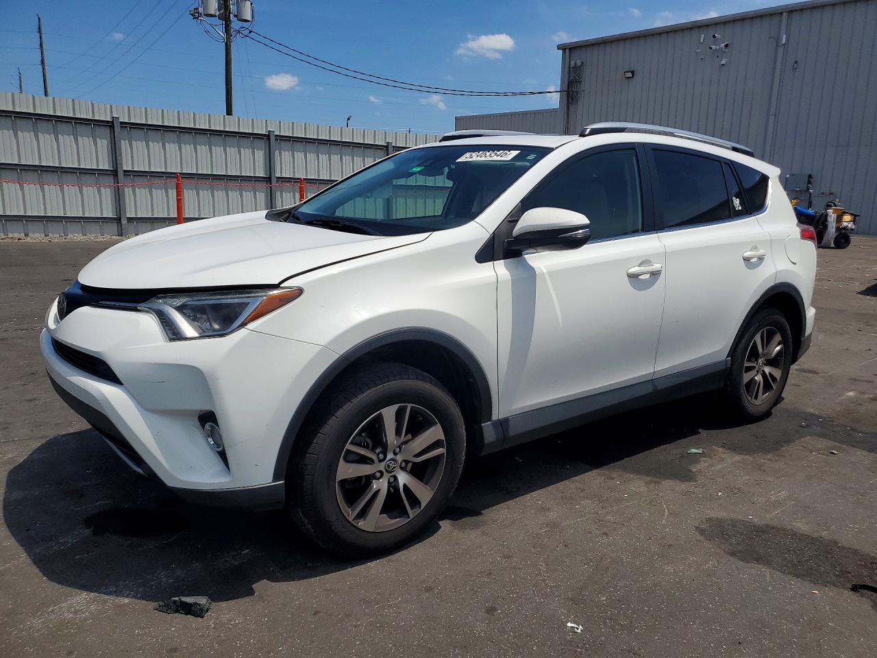 2018 TOYOTA RAV 4 — VIN JTMWFREV6JJ162955 — photo 1 of 14